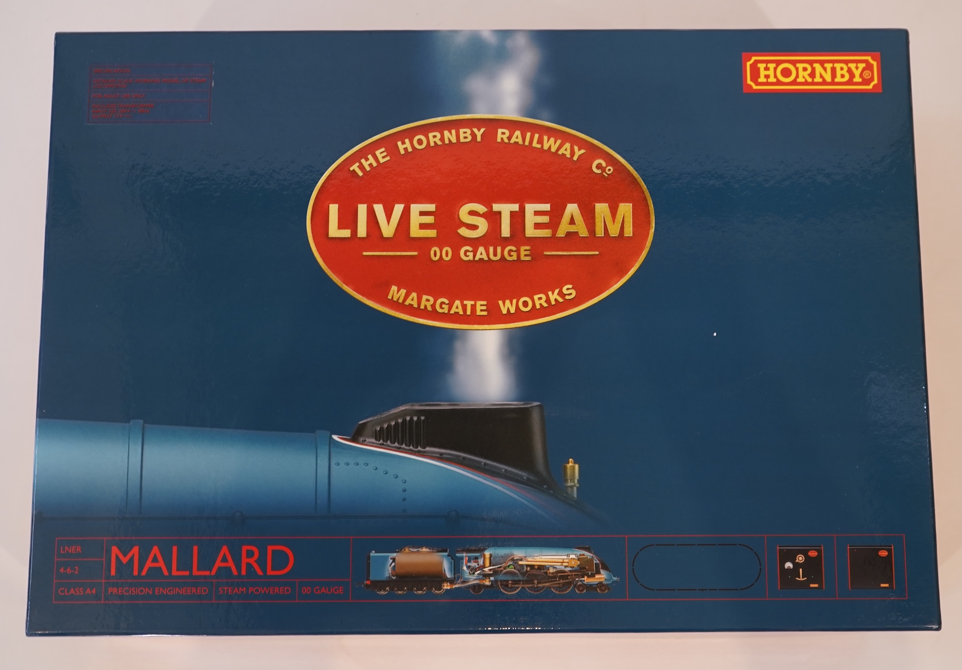 A Hornby Railway Co. 00 gauge live steam train set (R1041), comprising an LNER Class A4 4-6-2 tender locomotive, Mallard 4468, and accessories, including controllers, etc.